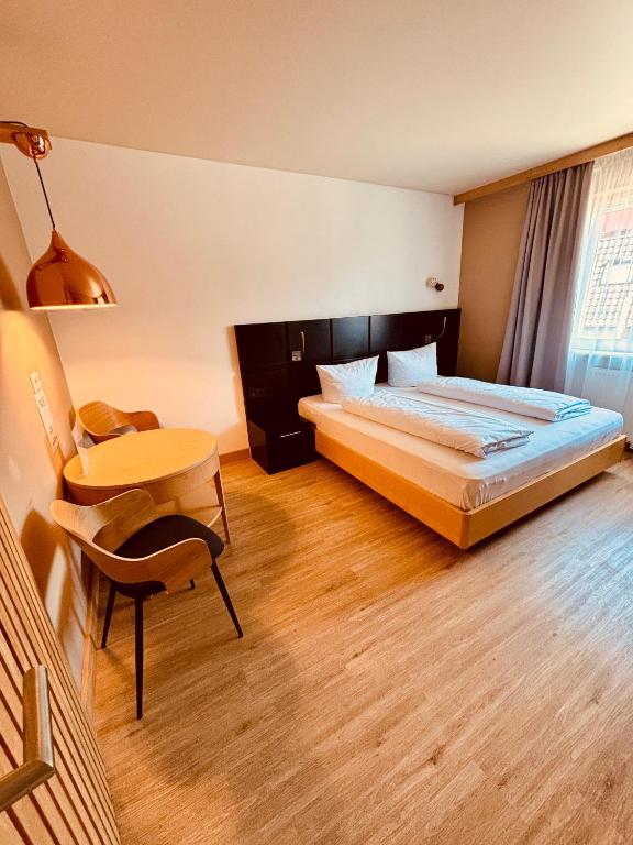 Postel nebo postele na pokoji v ubytování L-DOM