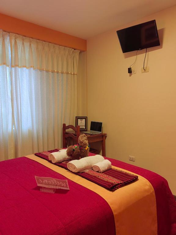 Postel nebo postele na pokoji v ubytování Hostel Sol Andina Inn