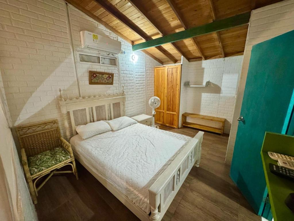 Postel nebo postele na pokoji v ubytování Apartaestudios Ofir