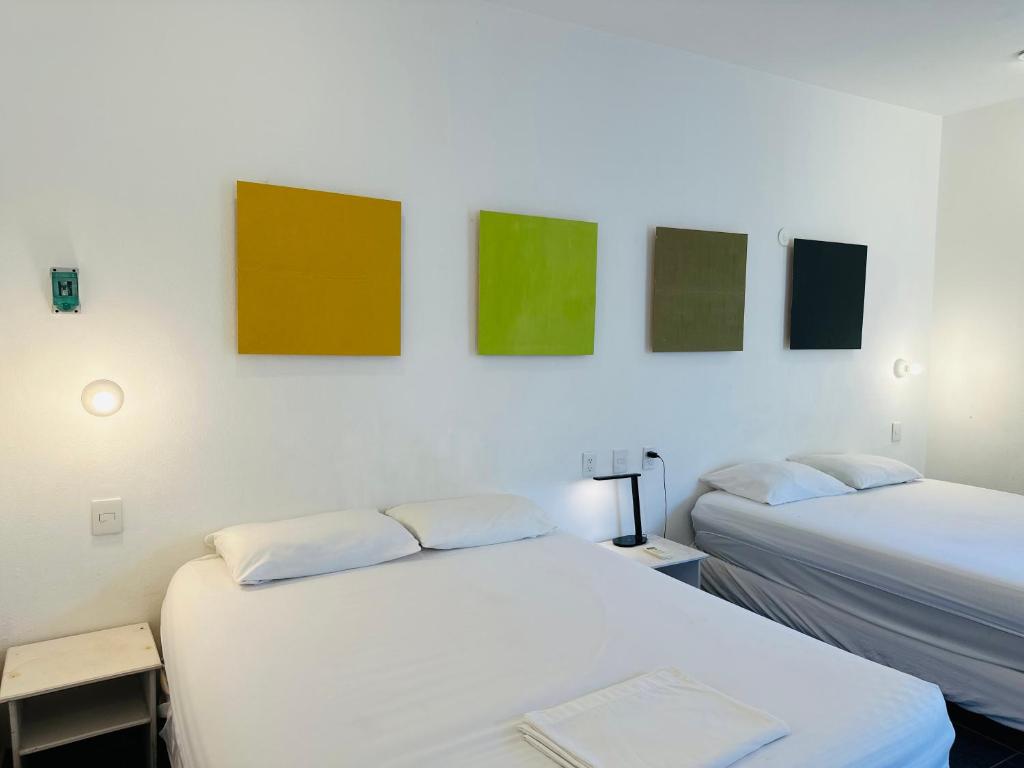 Postel nebo postele na pokoji v ubytování Freelance Hostel