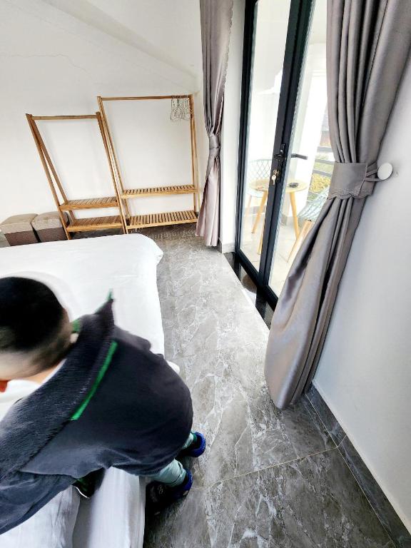 Posezení v ubytování Happy Bun Hotel Da Lat