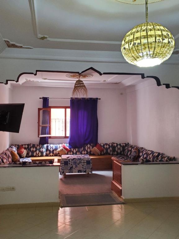 TV a/nebo společenská místnost v ubytování WARZAZAT Hostel