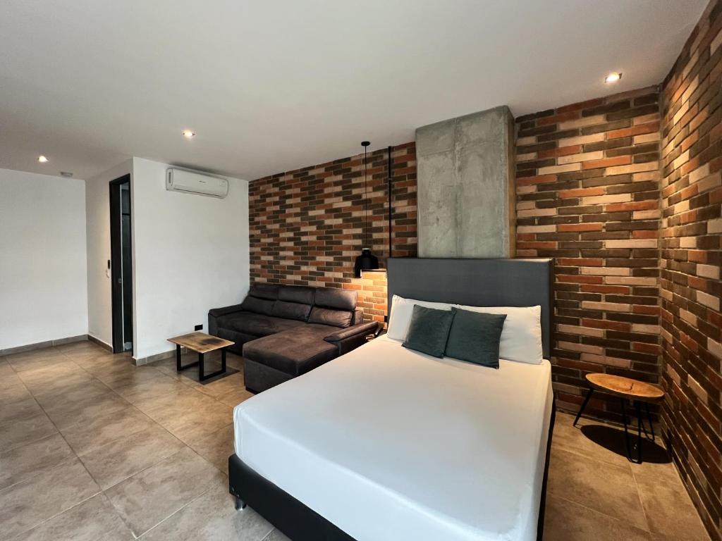 Postel nebo postele na pokoji v ubytování Apartahotel con Piscina