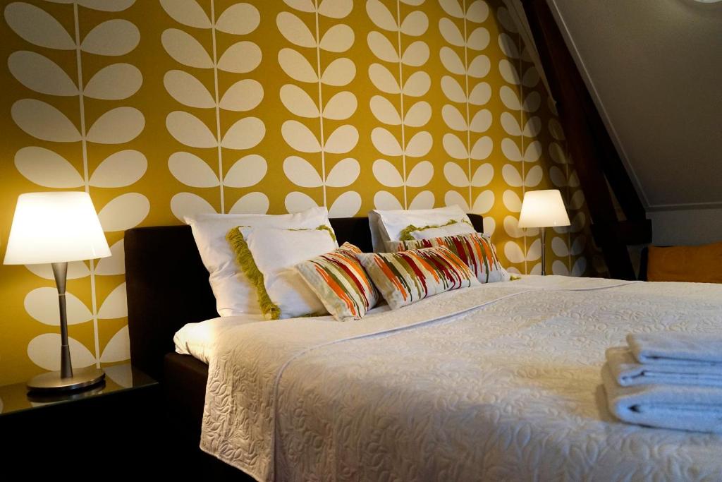 Postel nebo postele na pokoji v ubytování City Hotel Koningsvlinder