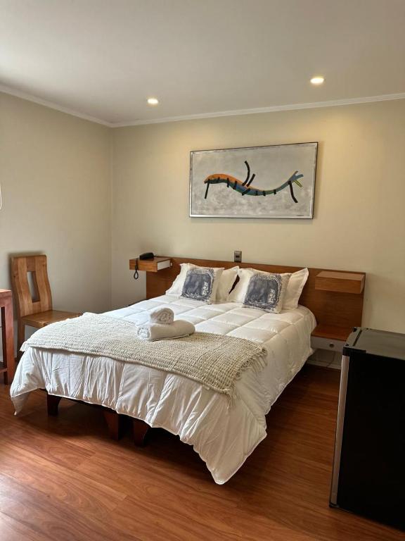 Postel nebo postele na pokoji v ubytování Hotel Ágora