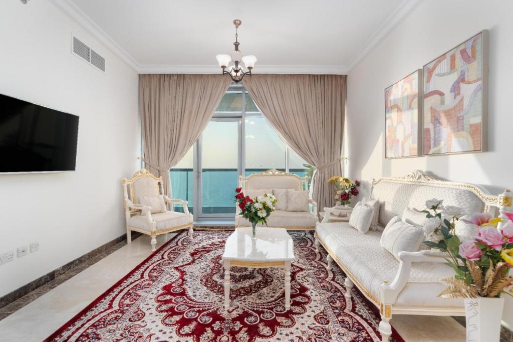 Televiisor ja/või meelelahutuskeskus majutusasutuses Ocean View Luxury Suites