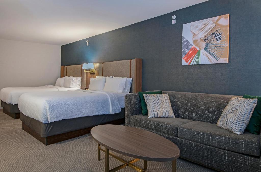 
Room with Two Queen Beds and a Sofa Bed
