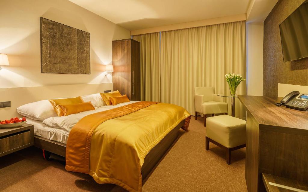 Postel nebo postele na pokoji v ubytování Horizont Resort