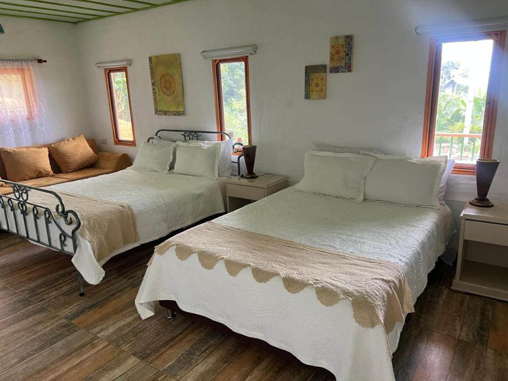 Postel nebo postele na pokoji v ubytování Montecanto