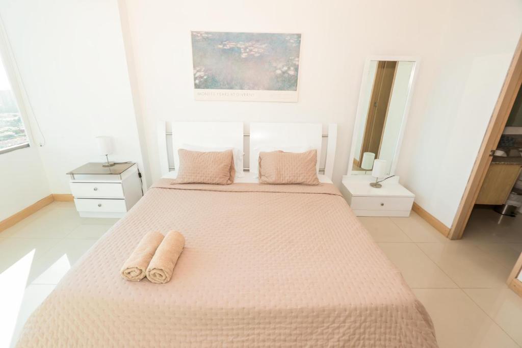 Postel nebo postele na pokoji v ubytování Exclusive Loft Bluegardens Hilton Inn Apartments Barranquilla