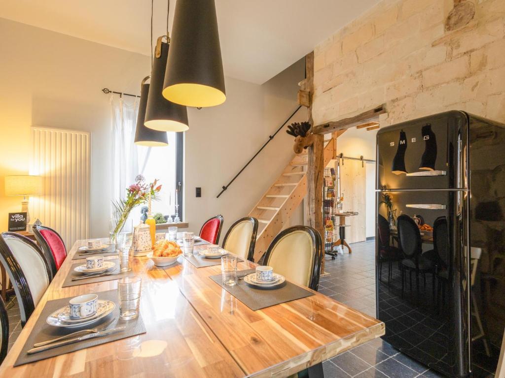 Kuchyň nebo kuchyňský kout v ubytování Maison Cuberdon