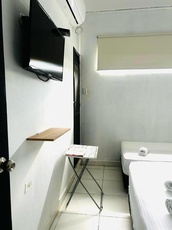 TV a/nebo společenská místnost v ubytování Riviera Central Hotel - Monteria