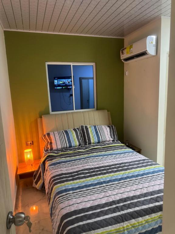 Giường trong phòng chung tại Cactus Beach Stay APARTAMENTO