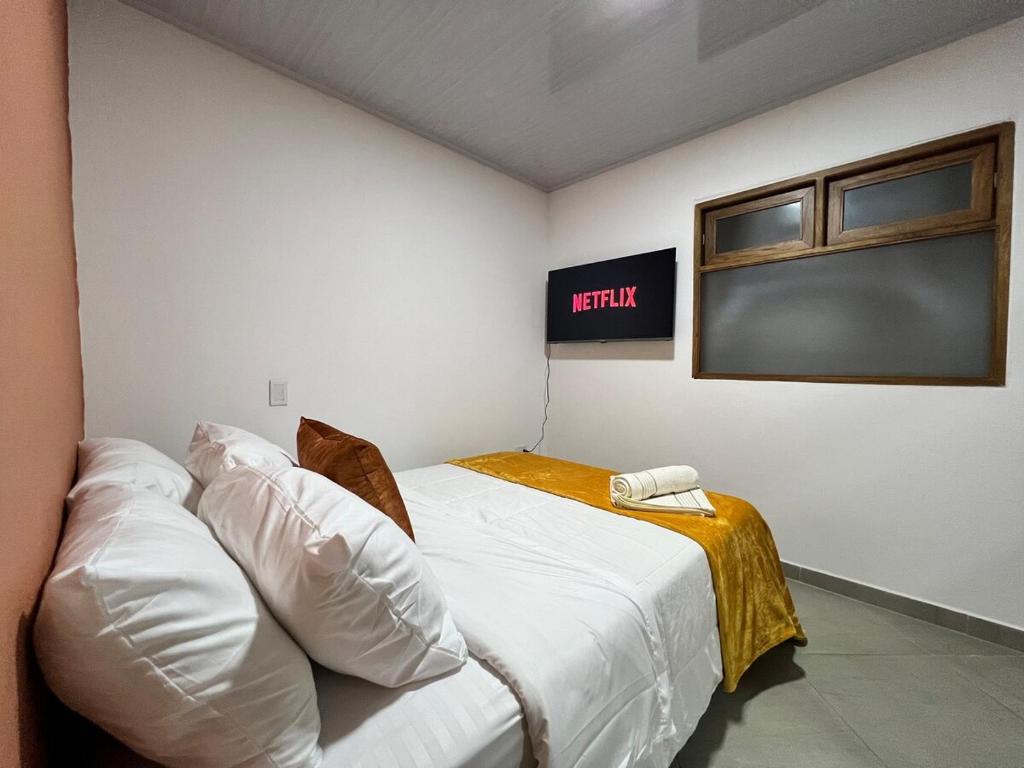 Letto o letti in una camera di Apto Carmelina - a solo dos cuadras del parque