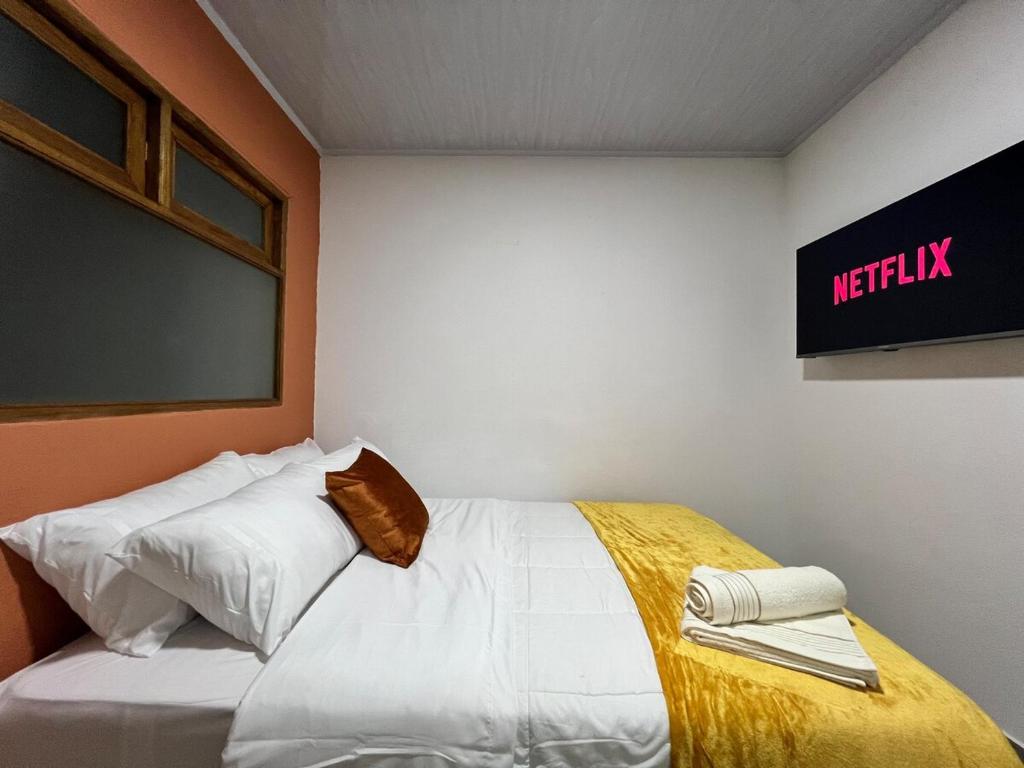 Letto o letti in una camera di Apto Carmelina - a solo dos cuadras del parque