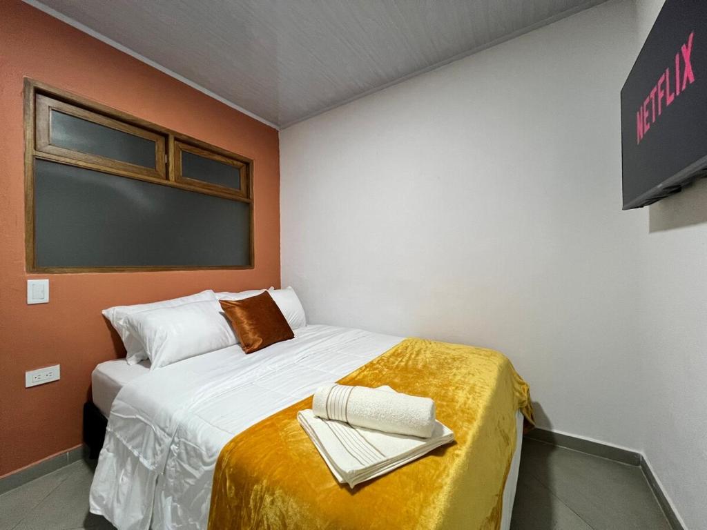 Letto o letti in una camera di Apto Carmelina - a solo dos cuadras del parque