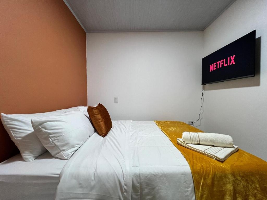 Letto o letti in una camera di Apto Carmelina - a solo dos cuadras del parque