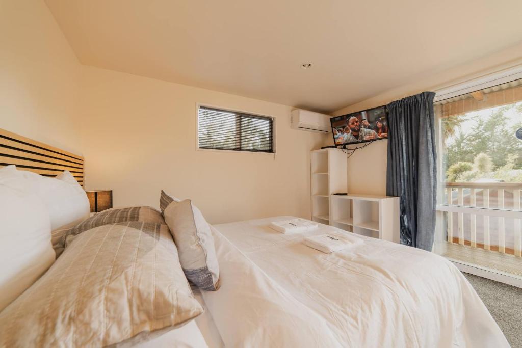 Ένα ή περισσότερα κρεβάτια σε δωμάτιο στο Meteor Suite for 3 - Parking Kitchenette