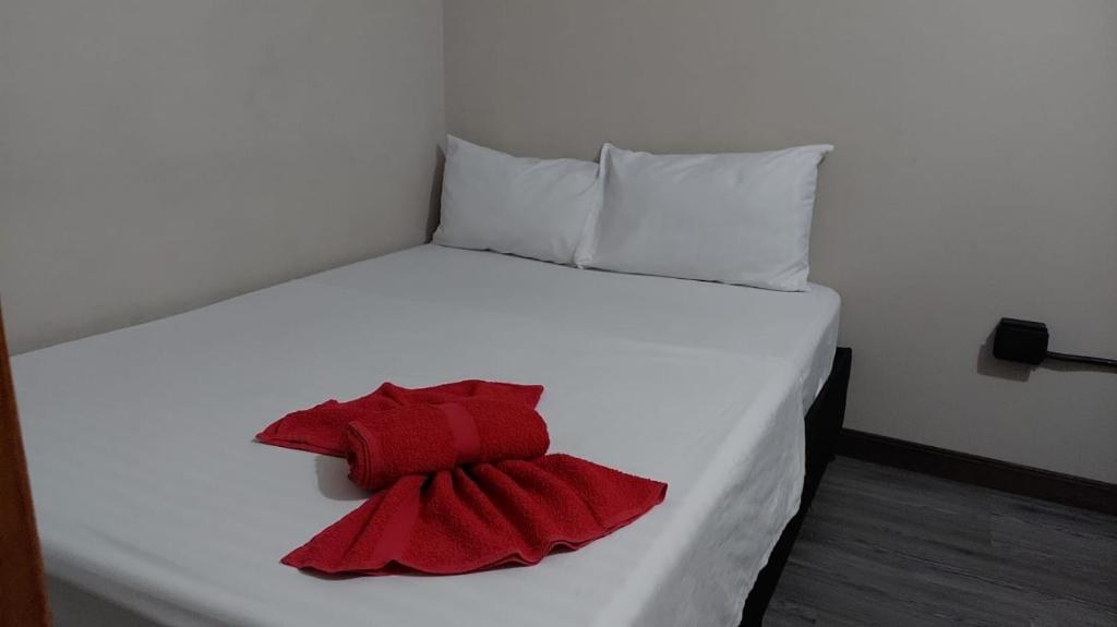 Postel nebo postele na pokoji v ubytování Hostal Machu Picchu Medellín III