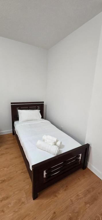 Postel nebo postele na pokoji v ubytování New Royal Inn
