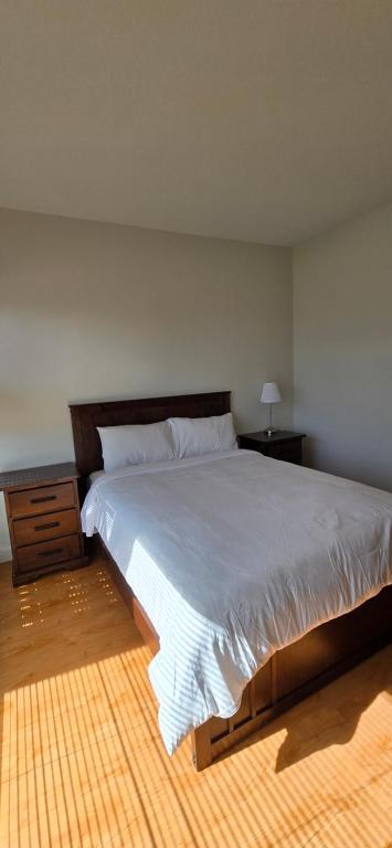 Postel nebo postele na pokoji v ubytování New Royal Inn