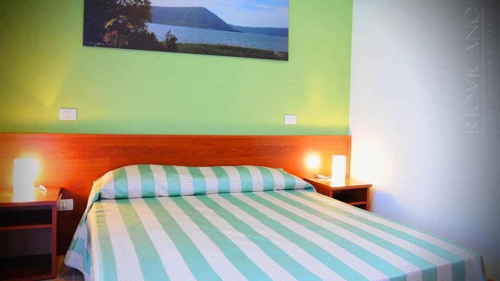 Postel nebo postele na pokoji v ubytování Rio Vicano Residence Hotel