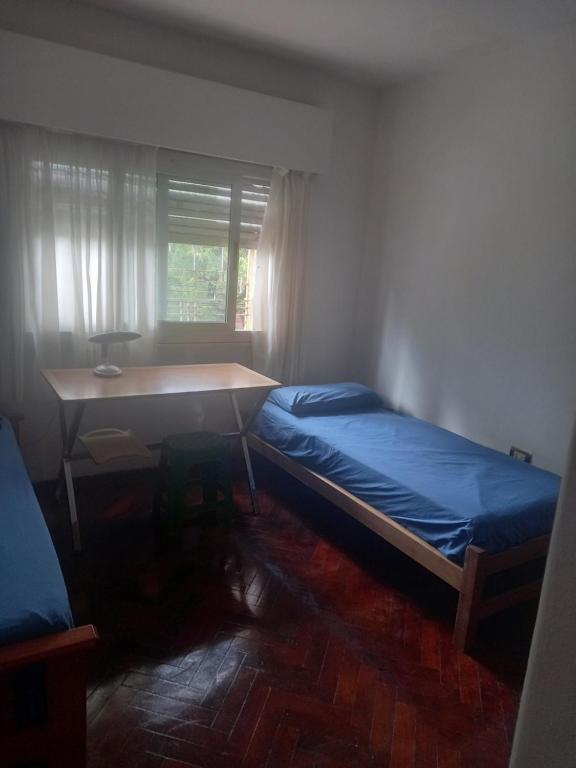 Postel nebo postele na pokoji v ubytování La Pochita