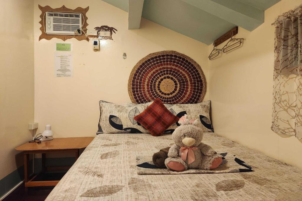 Postel nebo postele na pokoji v ubytování Balai Vivencio Hostel