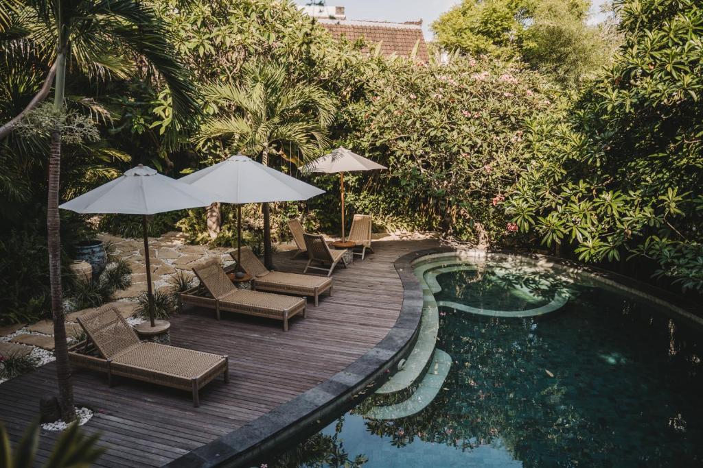 Bazén v ubytování Umakayu Joglo Villa Canggu - Boutique Hotel nebo v jeho okolí