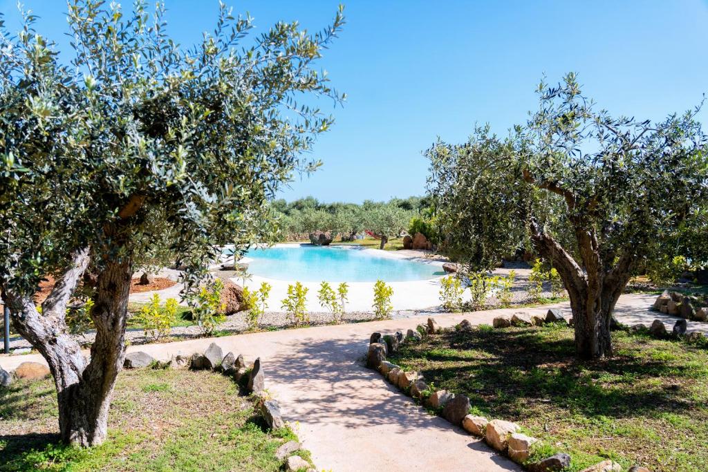 Bazén v ubytování Orosei RE - Il Paradiso degli Ulivi con PISCINA e vista mare nebo v jeho okolí