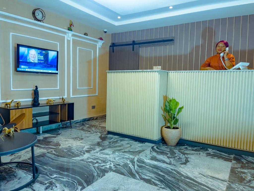 TV a/nebo společenská místnost v ubytování 154 Apartments and Hotel
