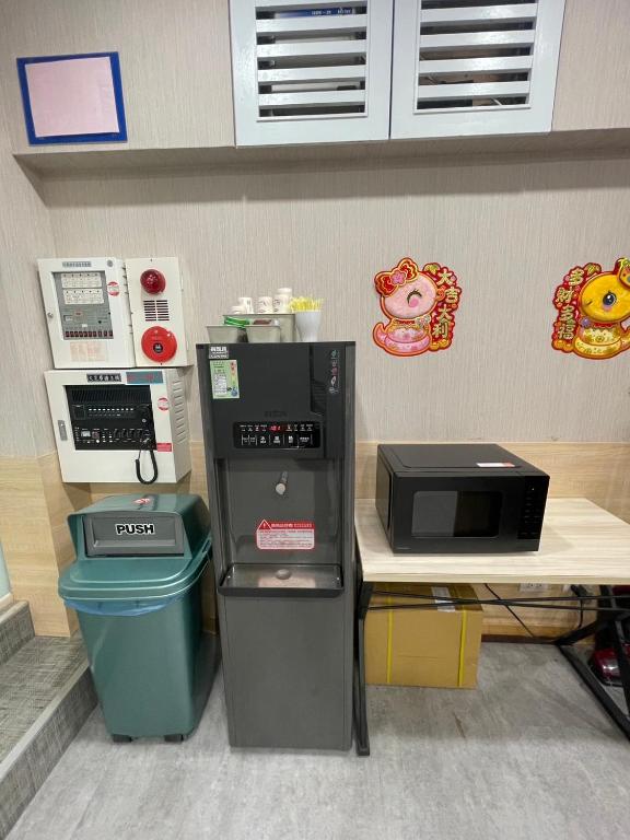 Kuchyň nebo kuchyňský kout v ubytování 成都壹壹壹商旅