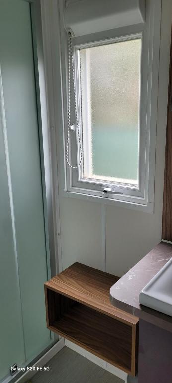 Postel nebo postele na pokoji v ubytování FMLODGE mobilhome oranger