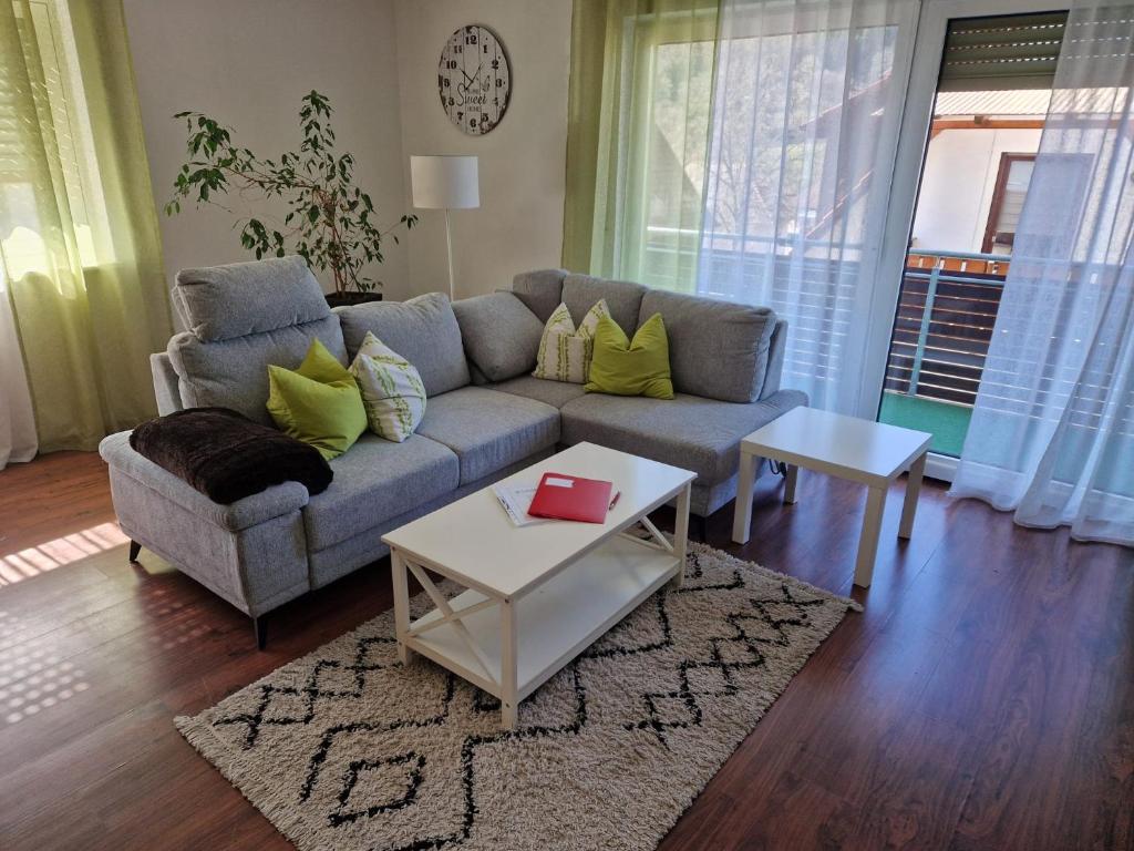 a living room with a couch and a table at Casa Katharina in Wald-Michelbach