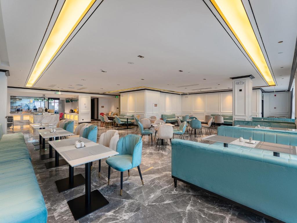 Restaurace v ubytování XANA Hotel Qionghai Municipal Government High-speed Railway Station