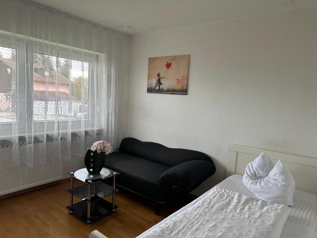 Postel nebo postele na pokoji v ubytování Appartementshaus Vlora