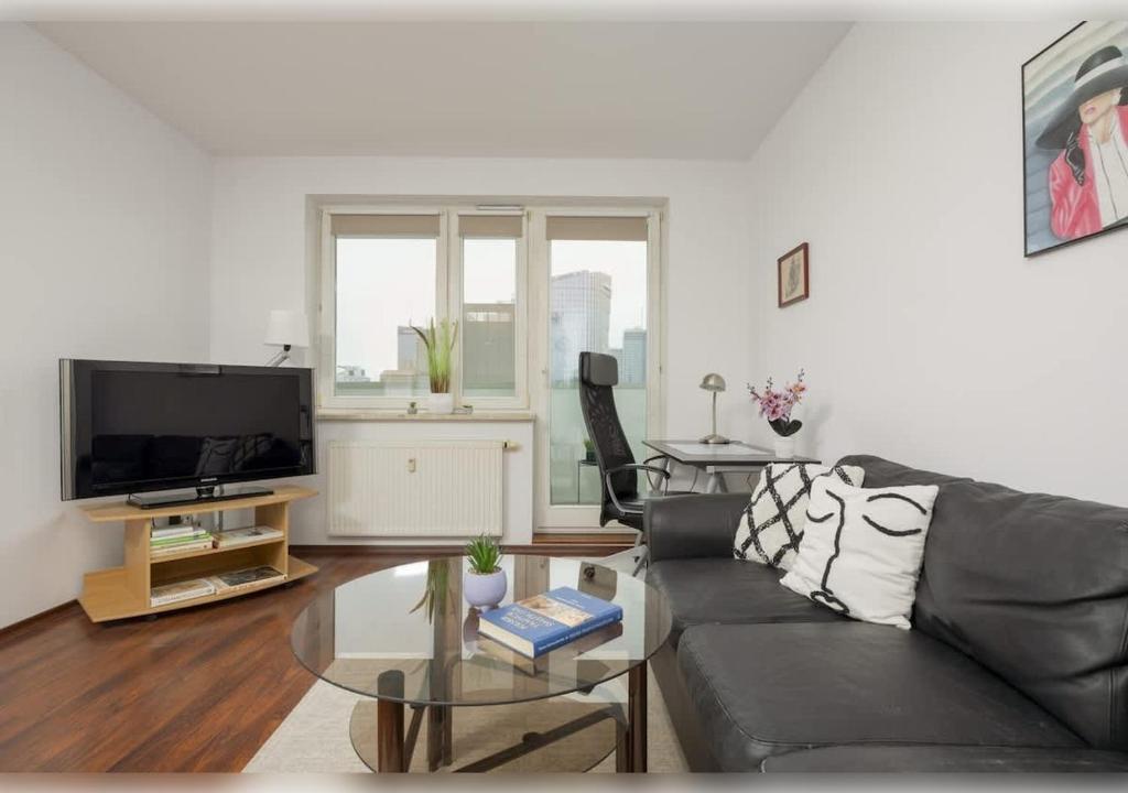 Et tv og/eller underholdning på Beautiful City Apartment by Noclegi Renters