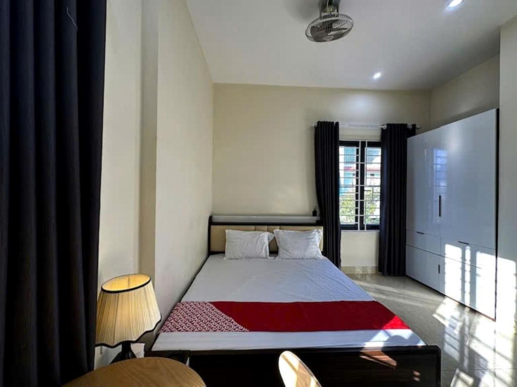 Postel nebo postele na pokoji v ubytování Dũng Quyến Homestay