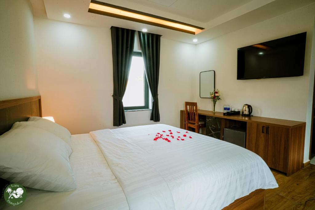 Postel nebo postele na pokoji v ubytování LAM BUNGALOW Resort & Spa