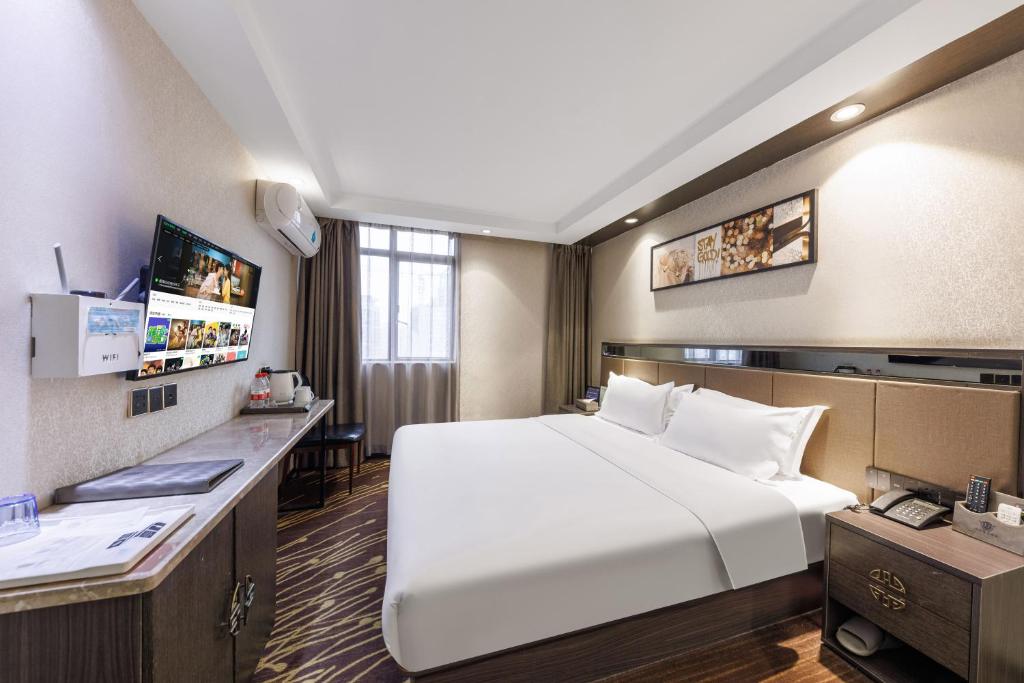 TV a/nebo společenská místnost v ubytování Fuhao Hotel