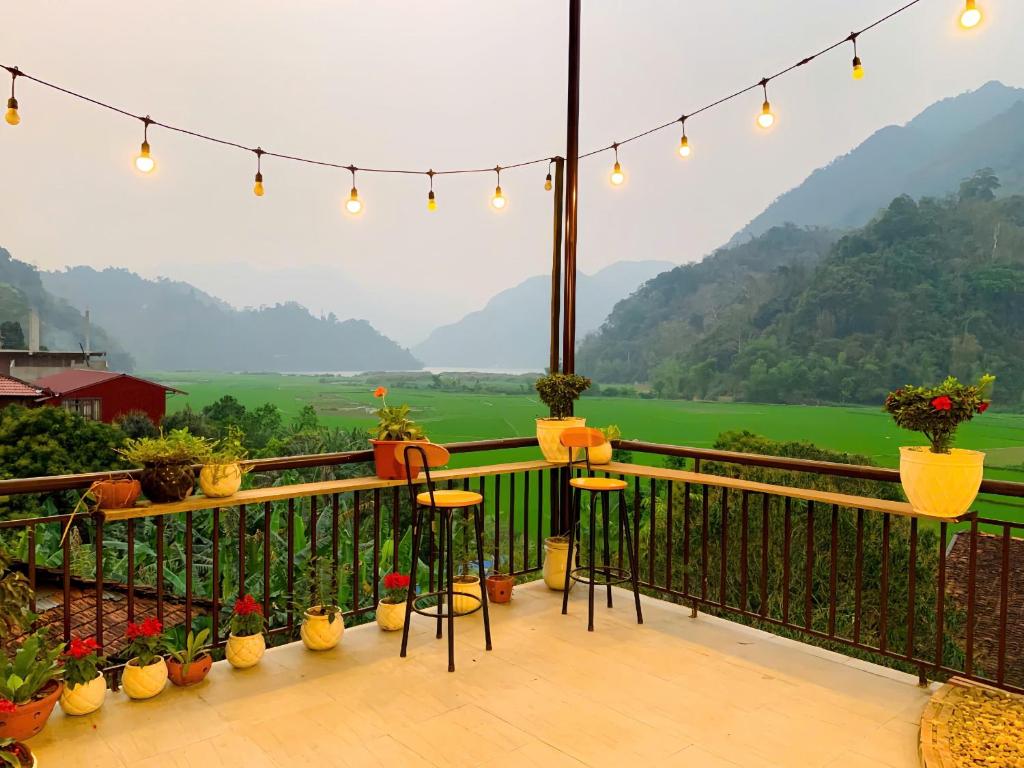 a balcony with a view of a valley and mountains at Duy Tuyen Ba Be Homestay in Bak Kan