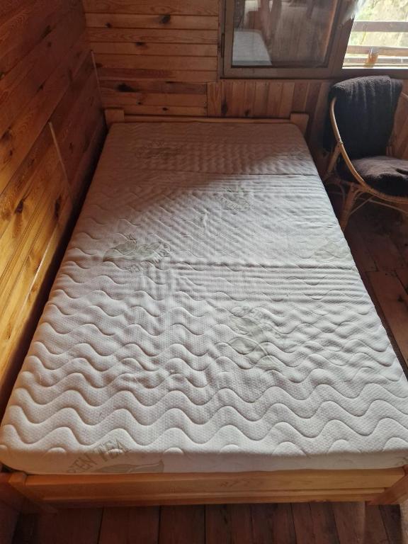Postel nebo postele na pokoji v ubytování Chata Kožíšek