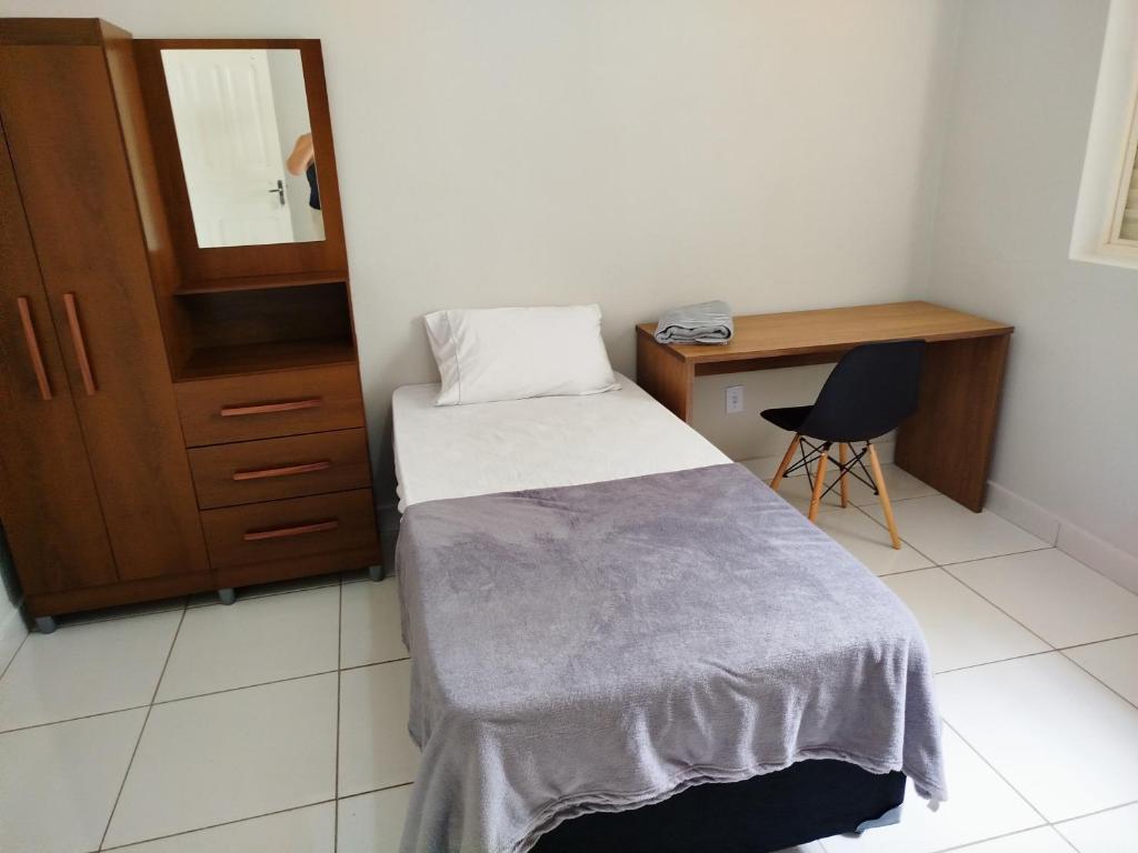 Postel nebo postele na pokoji v ubytování Refúgio Hostel Unidade 2