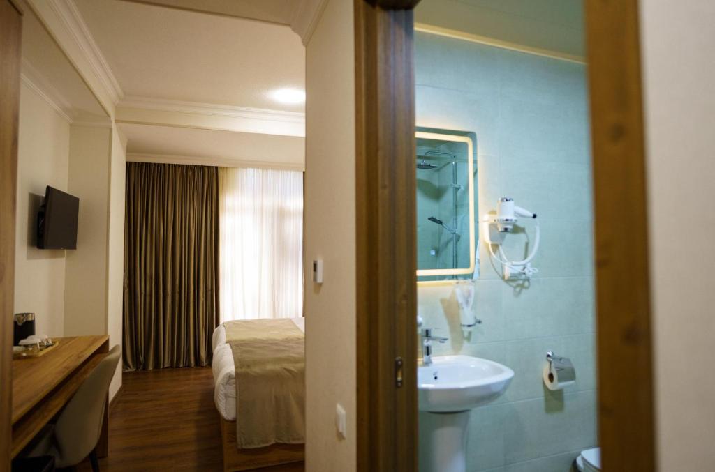 Koupelna v ubytování Green Palace Kutaisi