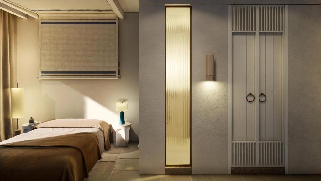 Postel nebo postele na pokoji v ubytování Atlantis Hotel