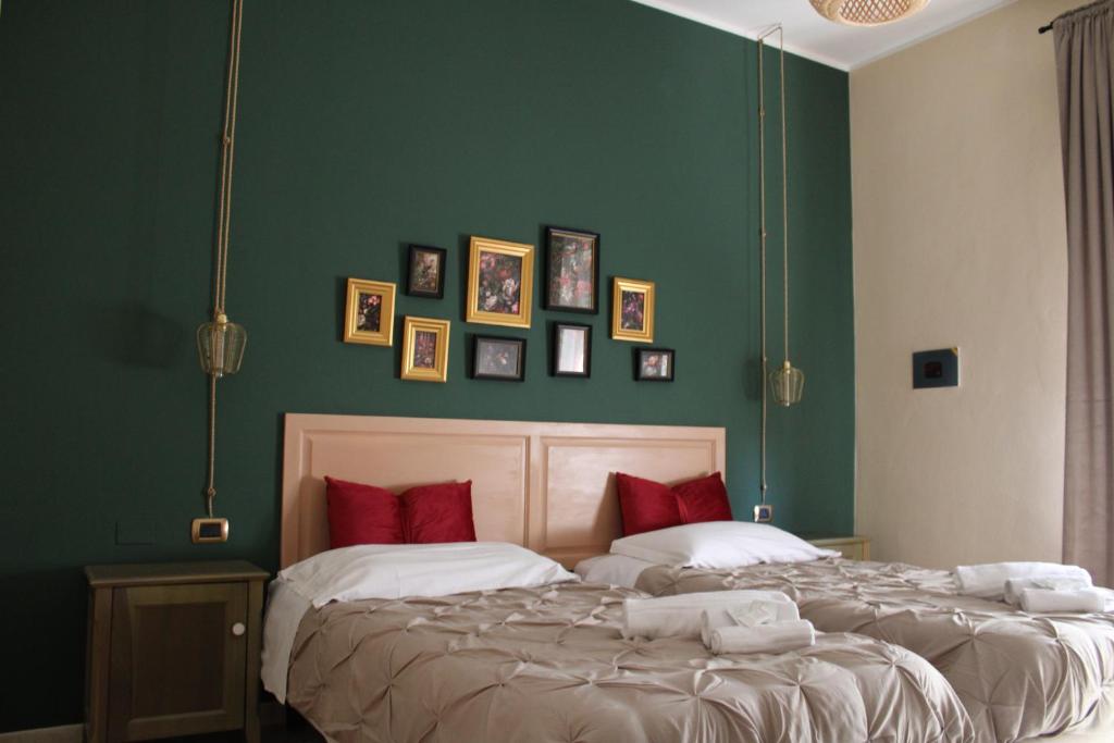 Postel nebo postele na pokoji v ubytování Hotel Monte Sirai