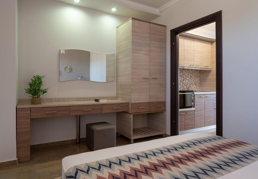 Kuchyň nebo kuchyňský kout v ubytování Anthemida Rooms