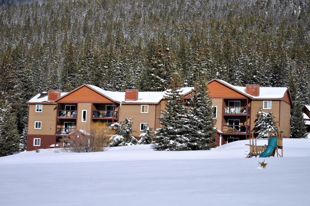 a lodge in the snow with snow covered trees at Blue River Condos 3 Bed 2 Bath BRLR in Blue River
