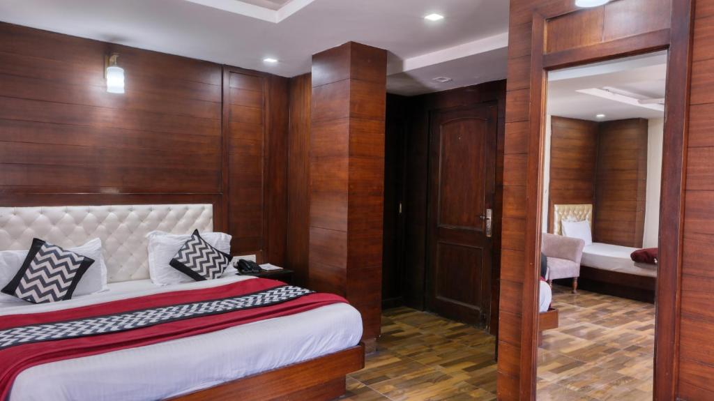 Voodi või voodid majutusasutuse Basera Hotel toas