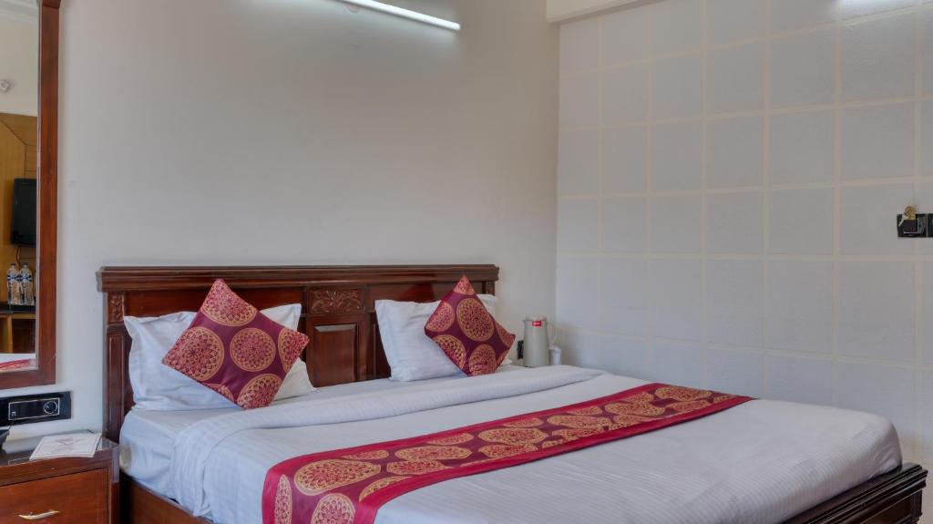 Voodi või voodid majutusasutuse Basera Hotel toas